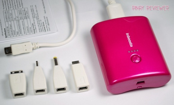 Inboosta Travel Booster and all the plugs and cords that come with it[2]